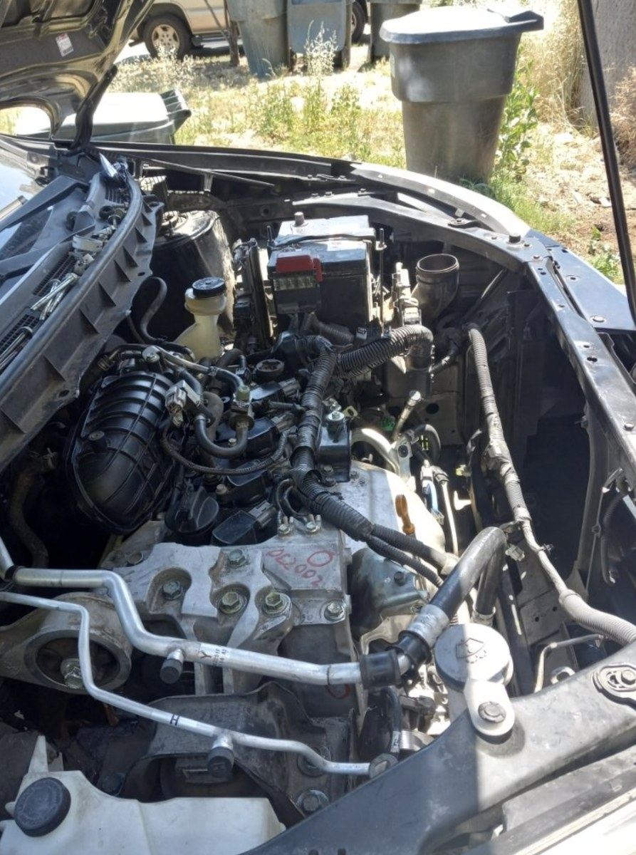 Deep diagnostic work in a Tulsa engine bay