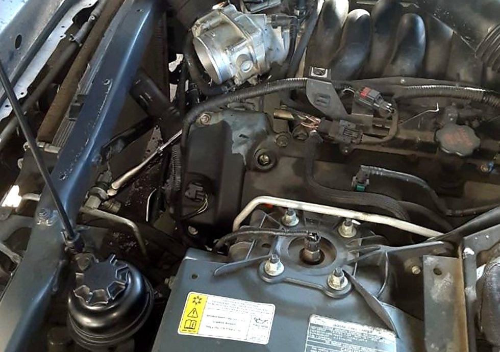 Under-hood repair at an Owasso home near Tulsa